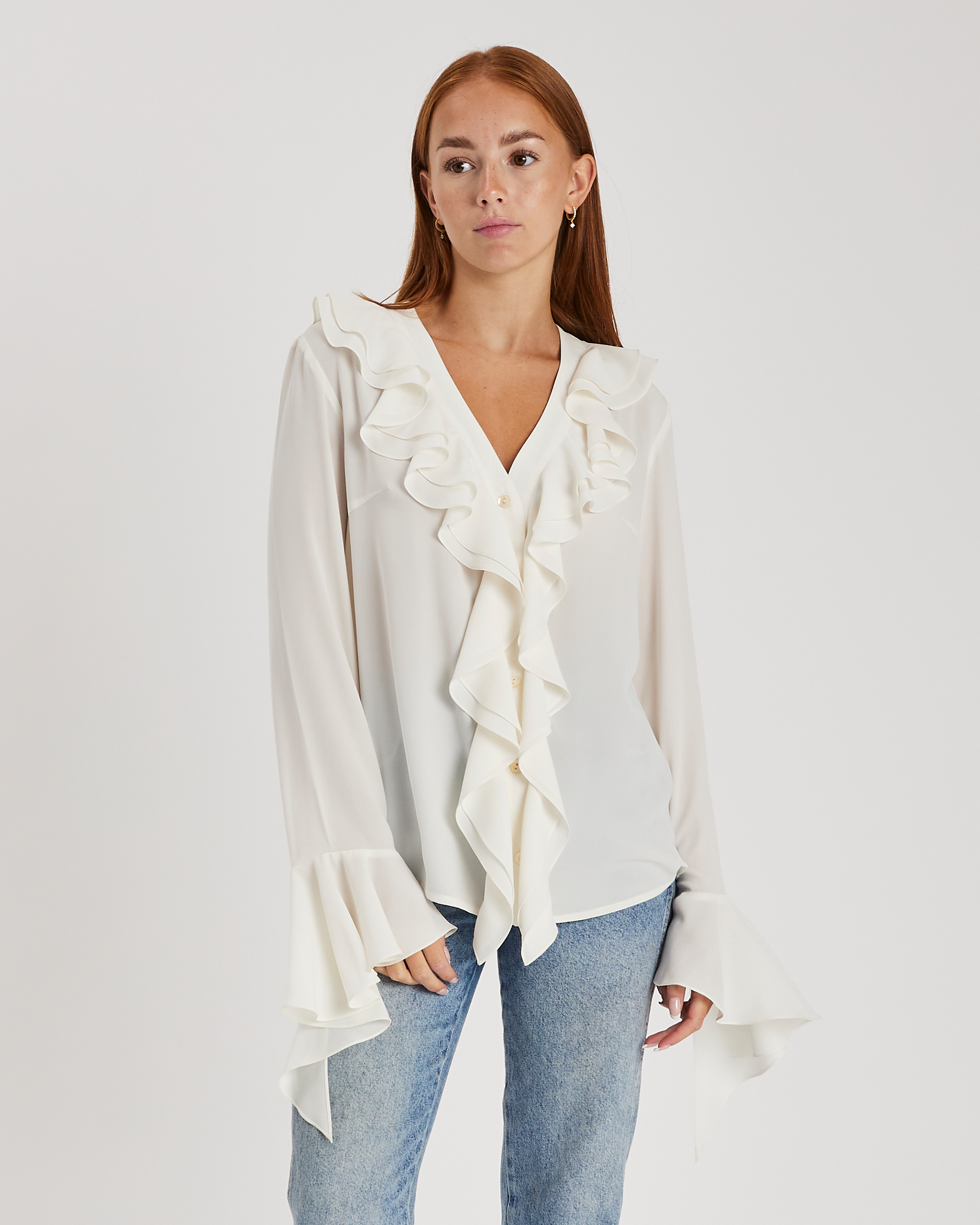 Tailored Fit Blouse with V-Neckline, Elegant Ruffles, and Asymmetrical Sleeve Detail